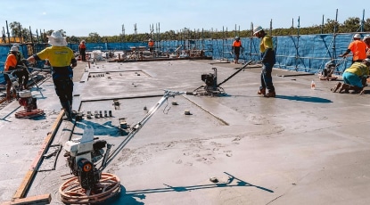 Worker using Concrete Finishing Machine — Concreters in Marlow Lagoon, NT