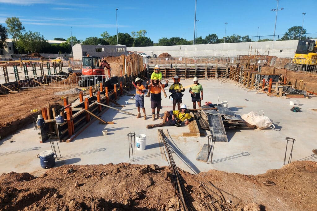 Happy Workers On Site — Concreters in Darwin, Northern Territory