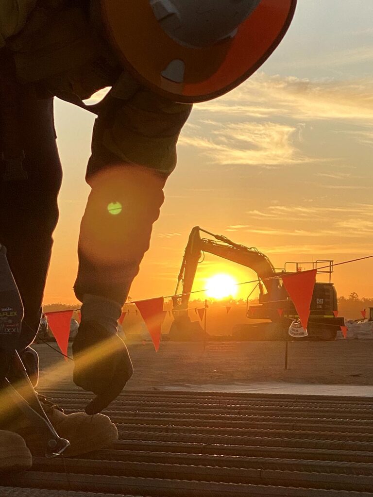 Workers Working At Sunset — Concreters in Darwin, Northern Territory